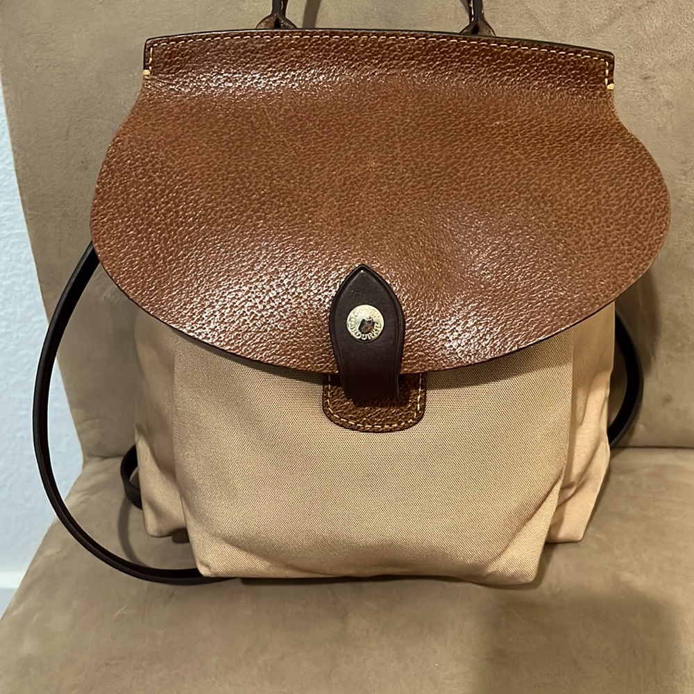 Dooney and Bourke vintage tan backpack. Wonderful lightly used condition.